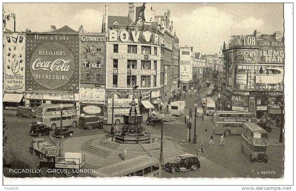 Cp Angleterre : LONDON Londre Piccadilly Circus ( Pub Coca Cola , Bière Guinness , Autobus , Automobiles ) - Piccadilly Circus