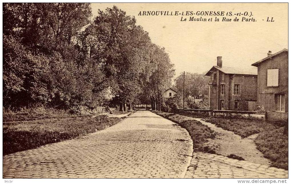 CPA. (95)     ARNOUVILLE LES GONESSE  Le Moulin Et La Rue De Paris - Arnouville Les Gonesses