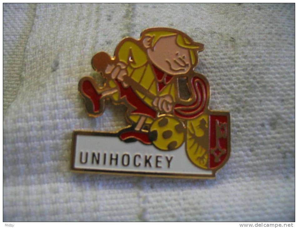 Pin's UNIHOCKEY, Sport D'equipe - Wintersport