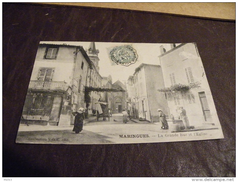 A168..CPA..63..PUY DE DOME..MARINGUES..La Grande Rue Et L'Eglise...rare Beau Plan Animé.ecrite & Voyagée 1906 - Maringues