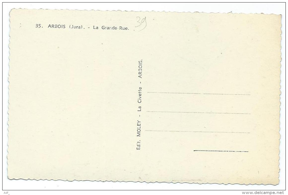 CPSM ARBOIS, LA GRANDE RUE, MAGASINS, COMMARCES, GARAGE, FABRIQUE DE MEUBLES, Format 9 Cm Sur 14 Cm Environ, JURA 39 - Arbois