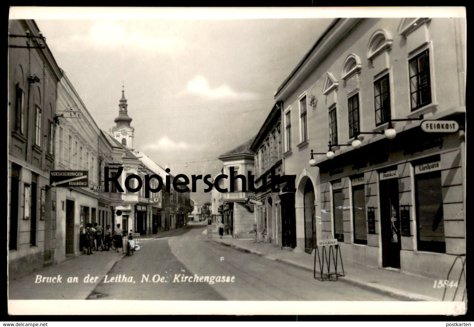 ALTE POSTKARTE BRUCK AN DER LEITHA N.Ö. KIRCHENGASSE FEINKOST JOHANN WINKLER VERSICHERUNGEN REISEBÜRO Cpa AK Postcard - Bruck An Der Leitha