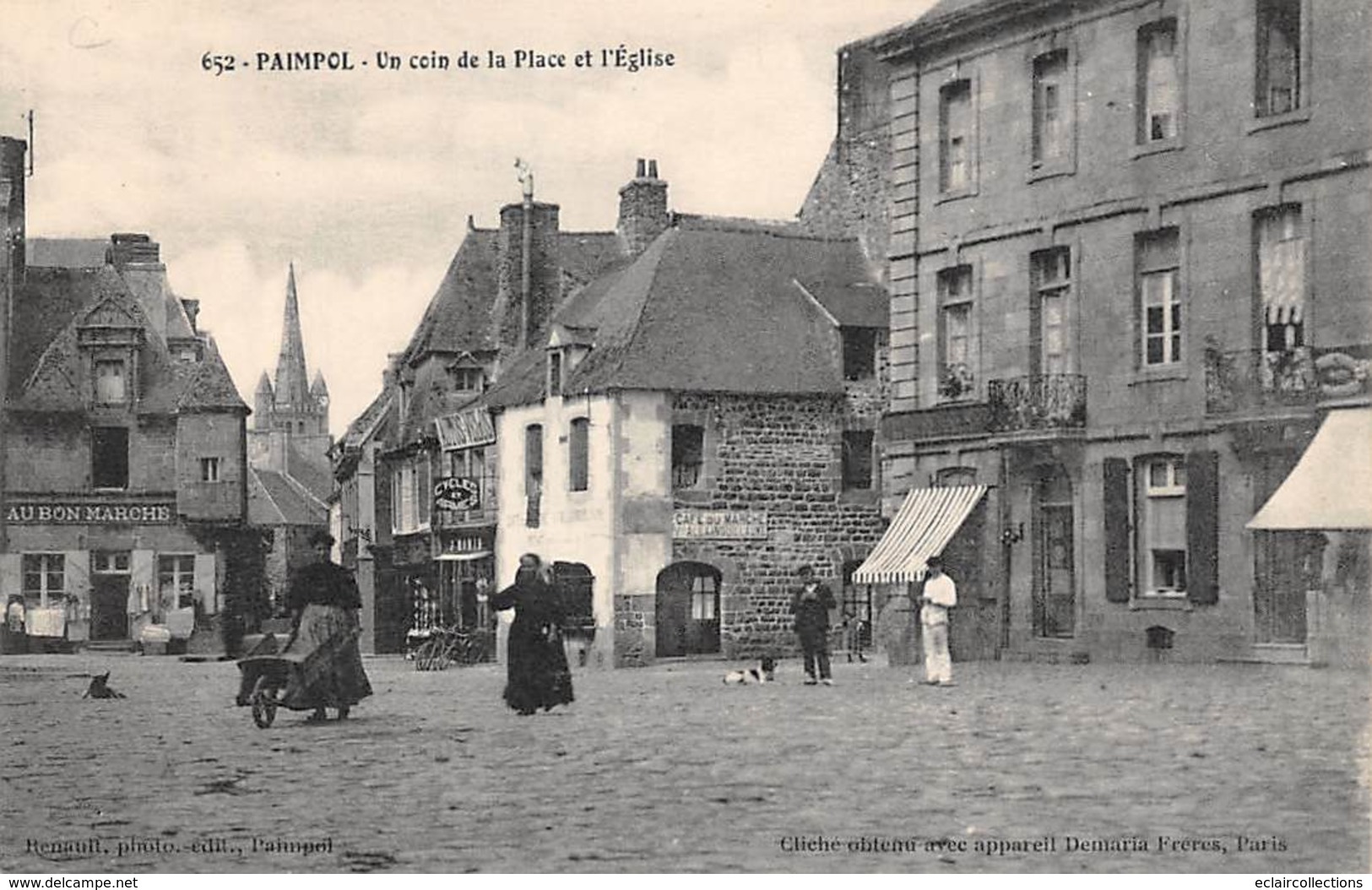 Paimpol       22      Un Coin De La Place Et L'église. Commerce   "Au Bon Marché"           (voir Scan) - Paimpol