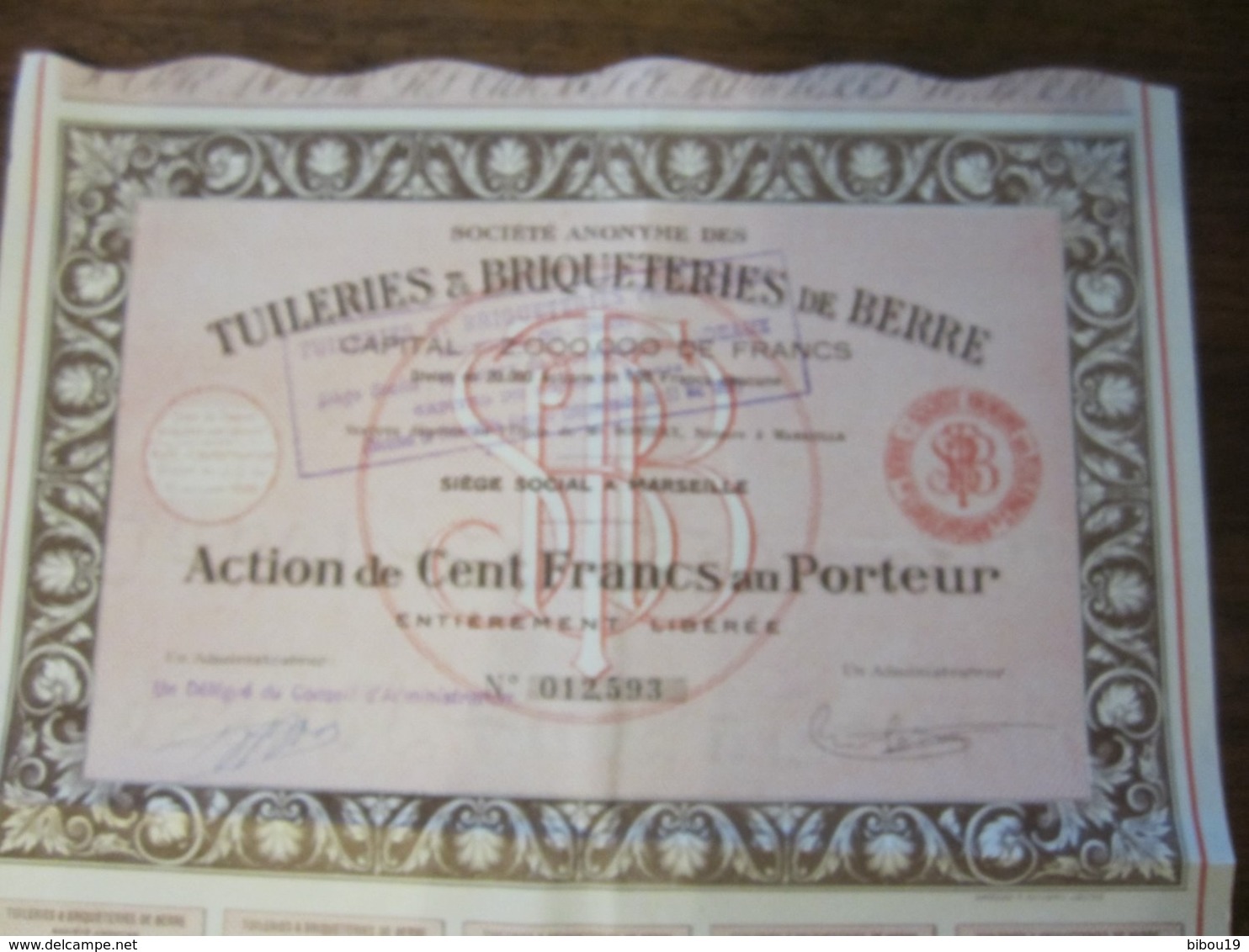 SOCIETE ANONYME DES TUILERIES ET BRIQUETERIES DE BERRE ACTION DE 100 FRANCS AU PORTEUR 1928 - S - V