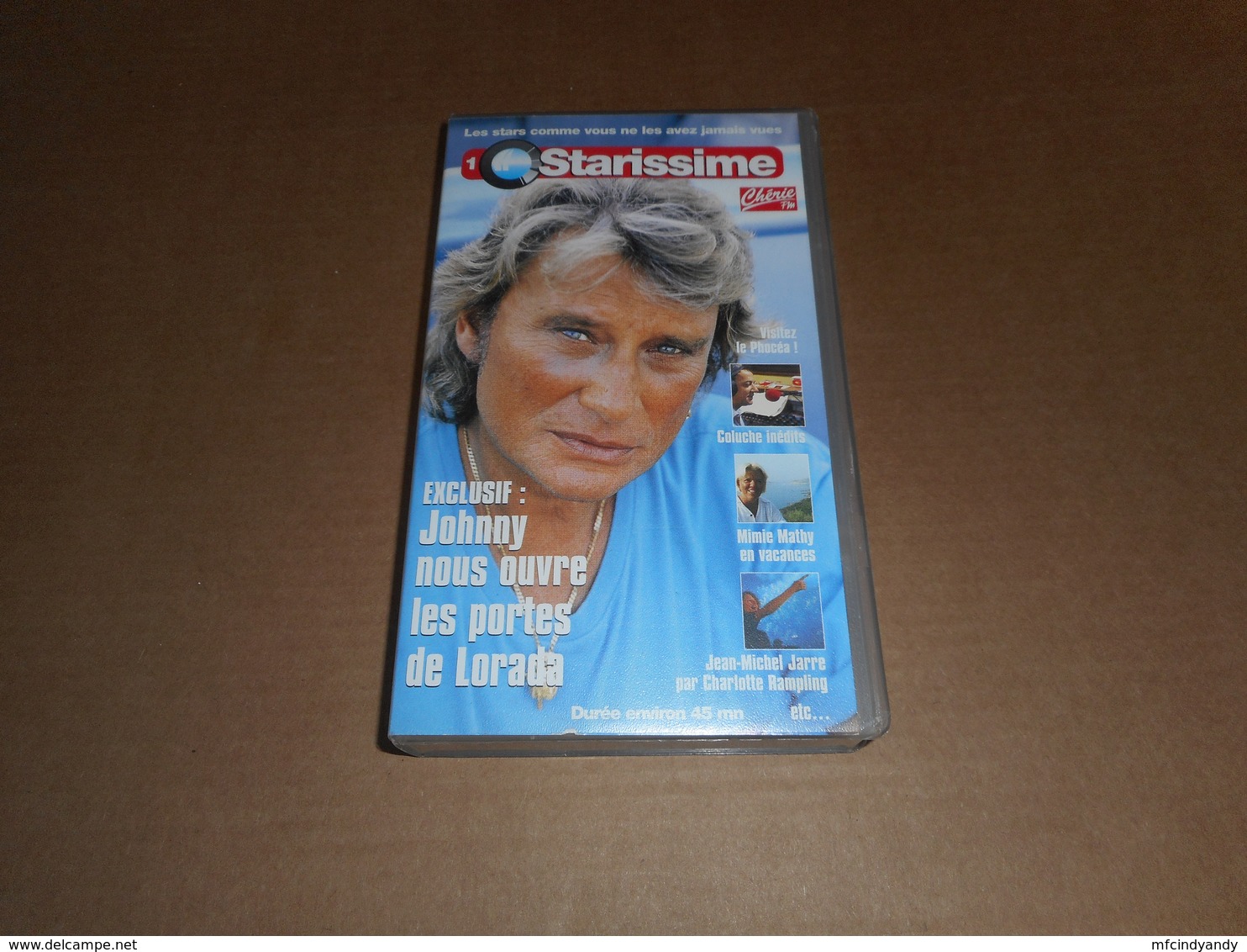 Cassette VHS - Johnny Hallyday -  Starissime - Avec Coluche, Mimie Mathy, Jean Michel Jarre ... - Concert & Music