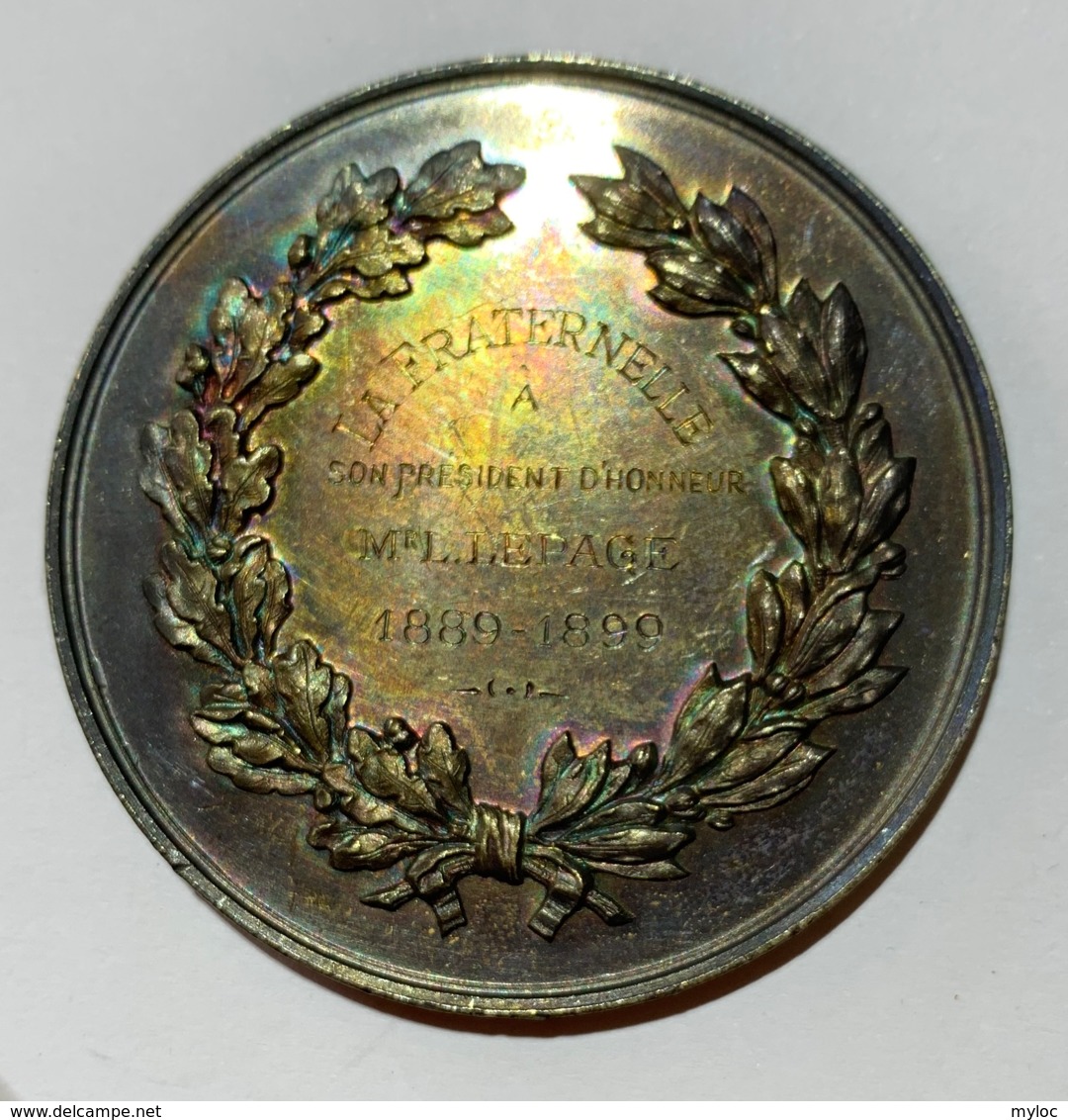 Médaille. Léopold II. La Fraternité à Son Président D'honneur Mr. L. Lepage. 1889-1899. 50 Mm. - Firma's
