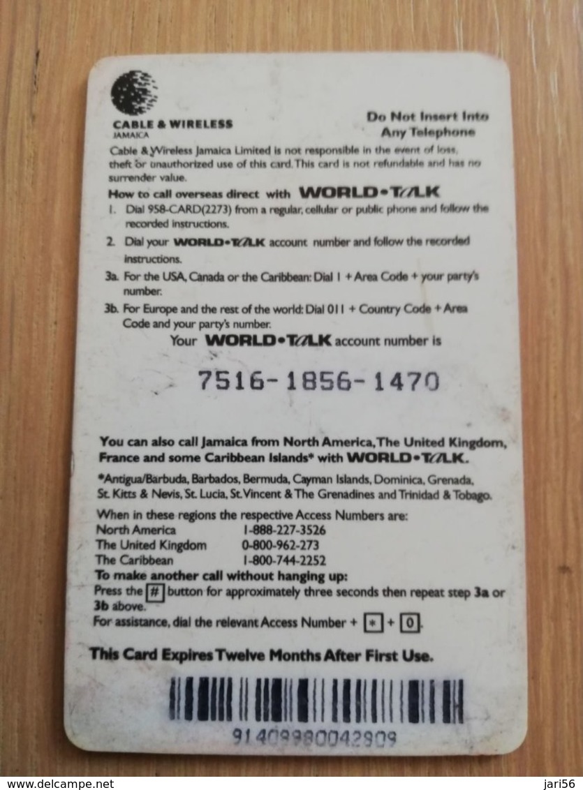 JAMAICA  J$100,-  PREPAID World -talk  THICK CARD Cable&wireless  P83  Fine Used Card  **2214** - Jamaïque