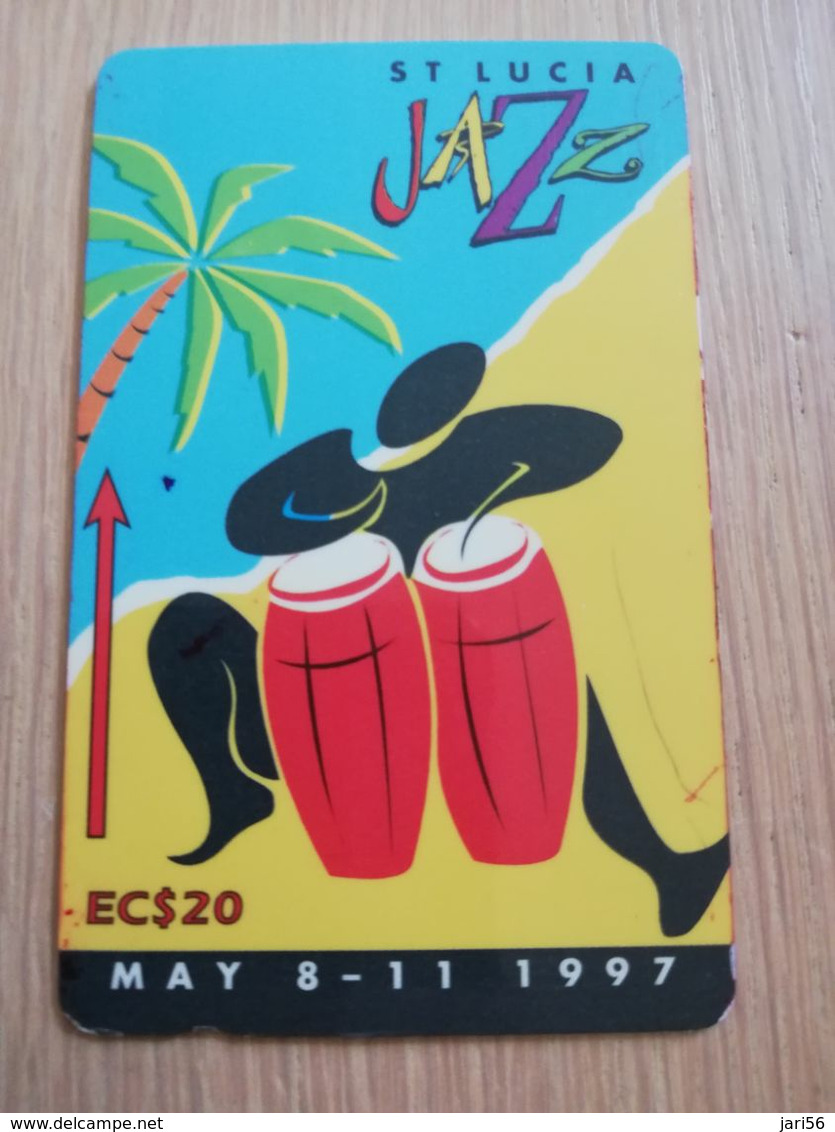 ST LUCIA    $ 20   CABLE & WIRELESS  STL-147E   147CSLE  JAZZ FESTIVAL 1997       Fine Used Card ** 2758** - Saint Lucia