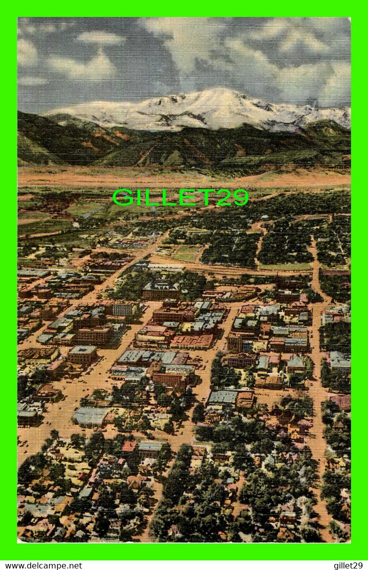 COLORADO SPRINGS, CO - AERIAL VIEW OF DOWNTOWN WITH PIKES PEAK IN THE BACKGROUND - SANBORN SOUVENIR CO - - Colorado Springs