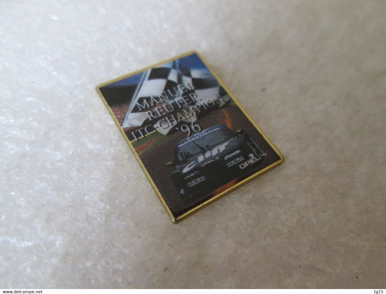 PIN'S    OPEL  CALIBRA   ITC  CHAMPION 1996 MANUEL  REUTER - Opel