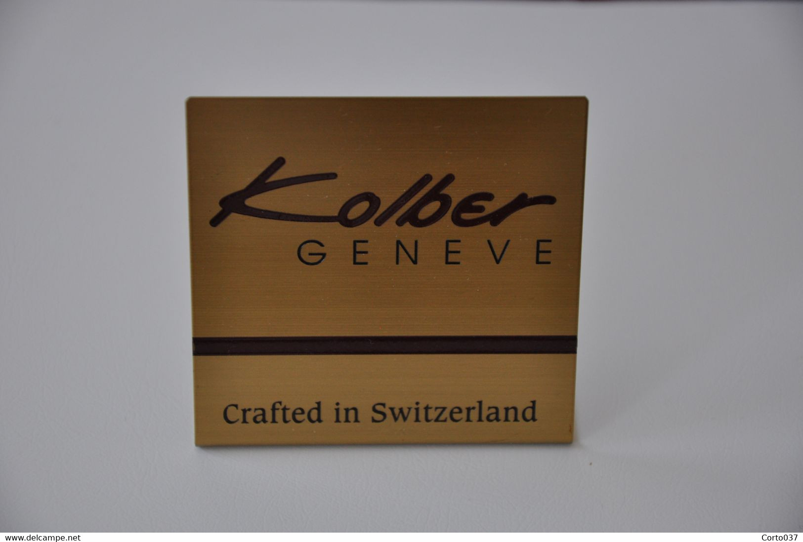 Plaque En Métal Revendeur 'Kolber Genève' - Plaques émaillées (après 1960)