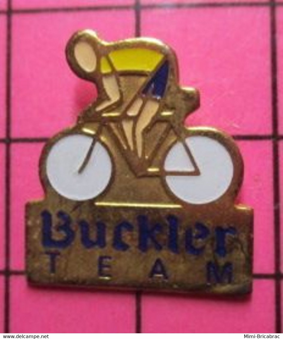 313f Pin's Pins / Beau Et Rare / THEME : SPORTS / CYCLISME MAILLOT JAUNE BUCKLER TEAM - Fechten