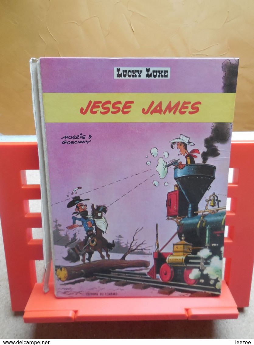 EO Lucky Luke Jesse James, Lombard + Objet Dérivés BD L'Arnaque.C302.22 - Lucky Luke