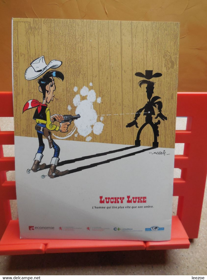EO Lucky Luke Jesse James, Lombard + objet dérivés BD L'Arnaque.C302.22