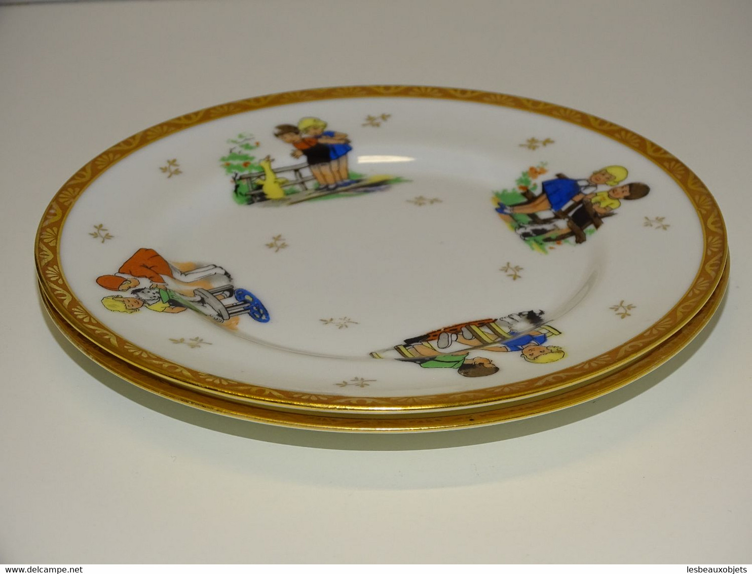 * 2 PETITES ASSIETTES PORCELAINE CHASTAGNER LIMOGES déco d'enfants Chiens 1930  E