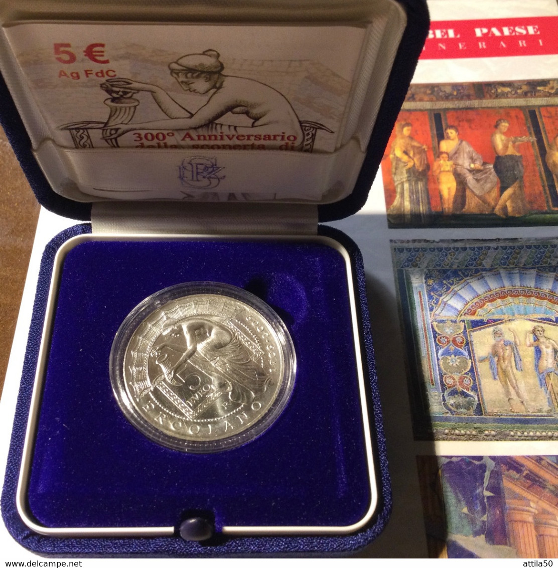 Scavi di Ercolano- 300 Anni dalla scoperta- Volume+moneta €5 Argento della Zecca italiana.