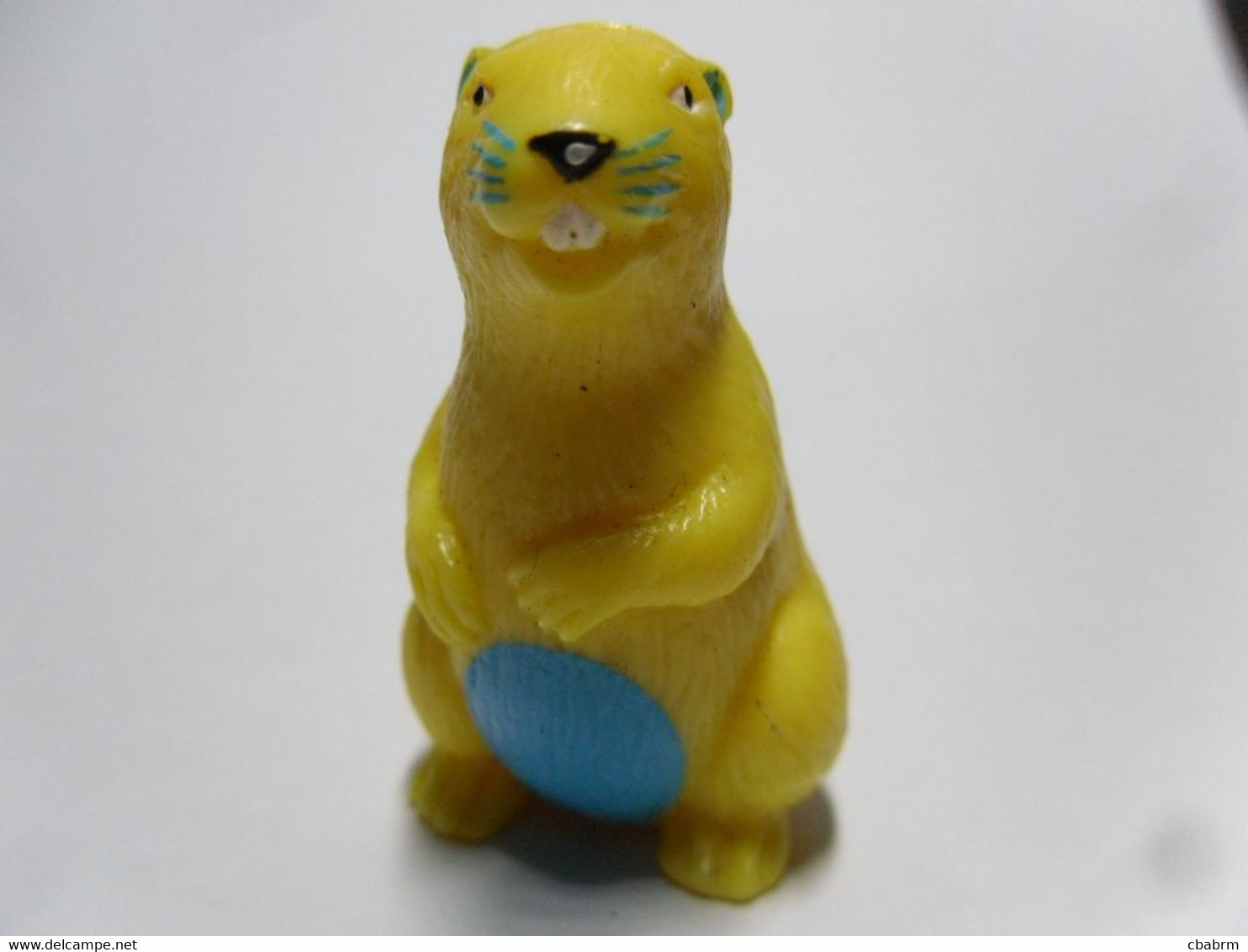 Figurine petit jouet CASTOR jaune et bleu