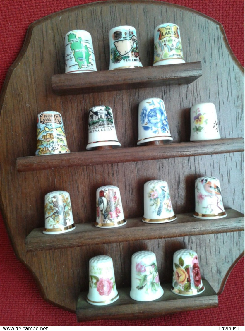 Set: 20 thimbles and a wooden case