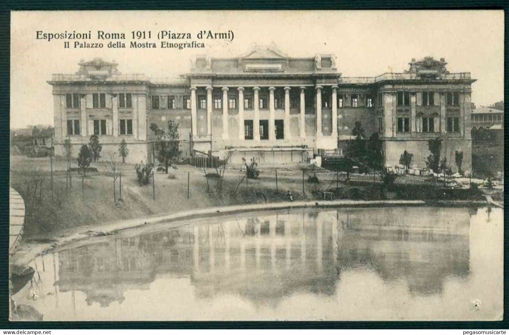 CLZ119 ESPOSIZIONI ROMA 1911 PIAZZA D'ARMI PALAZZO DELLA MOSTRA ETNOGRAFICA 1911 HA 2 FORI IN BASSO DA SPILLA - Exposiciones