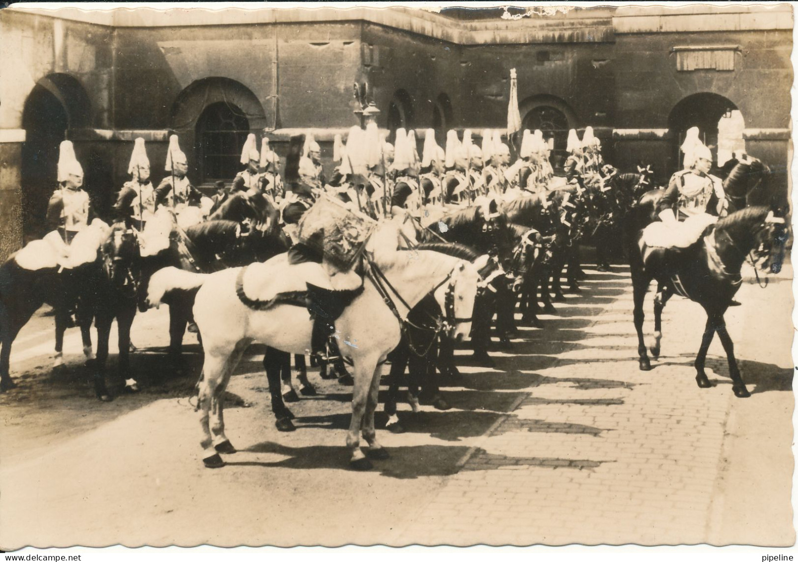 United Kingdom Postcard Sent To Mozambique From Spain With Spanish Stamps Covering A UK Stamp Changing Guard Whitehall - Whitehall