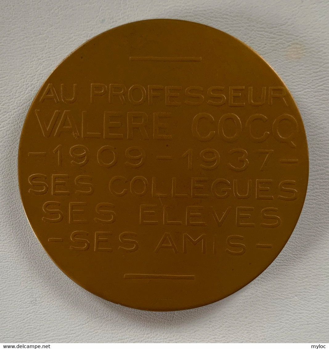 Médaille Bronze. Valère Cocq. Au Professeur Valère Cocq 1909-1934. Ses Collègues, Ses élèves, Ses Amis. A. Bonnetain - Firma's