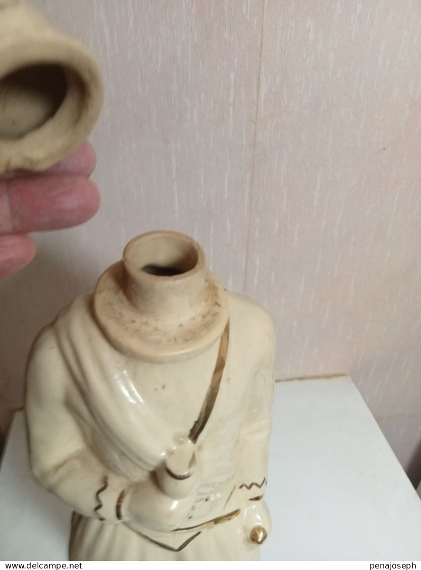 bouteille ancienne en céramique hauteur 33 cm lou noustere henric