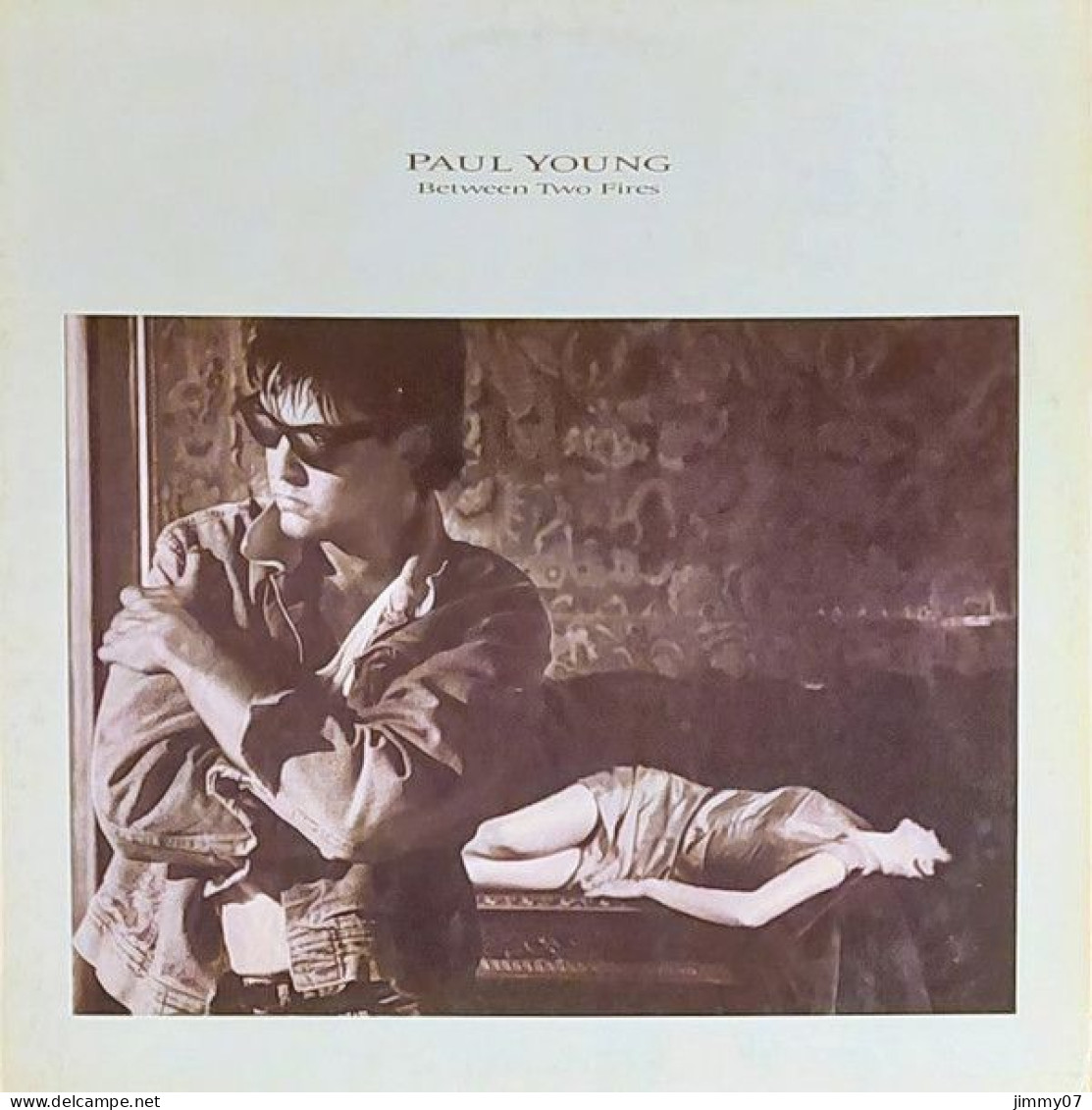 Paul Young - Between Two Fires (LP, Album) - Disco, Pop