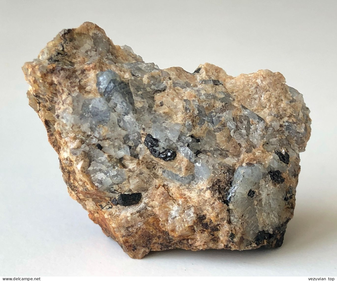 Columbite-(Fe), grey-blue Corundum in Feldspar matrix