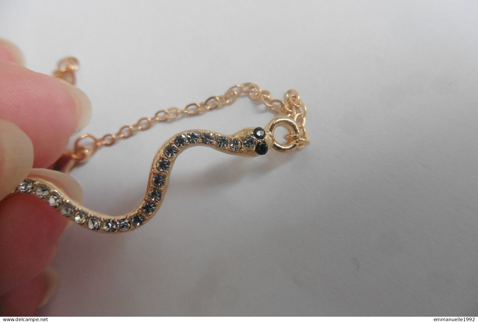 Neuf - Bracelet réglable chaine métal doré serpent serti strass yeux couleur émeraude
