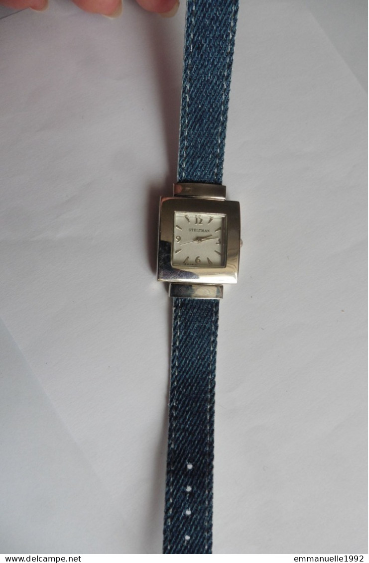 Montre Femme Réversible Steltman Métal Argenté Tissu Jean Bleu Et Cuir Blanc - Moderne Uhren