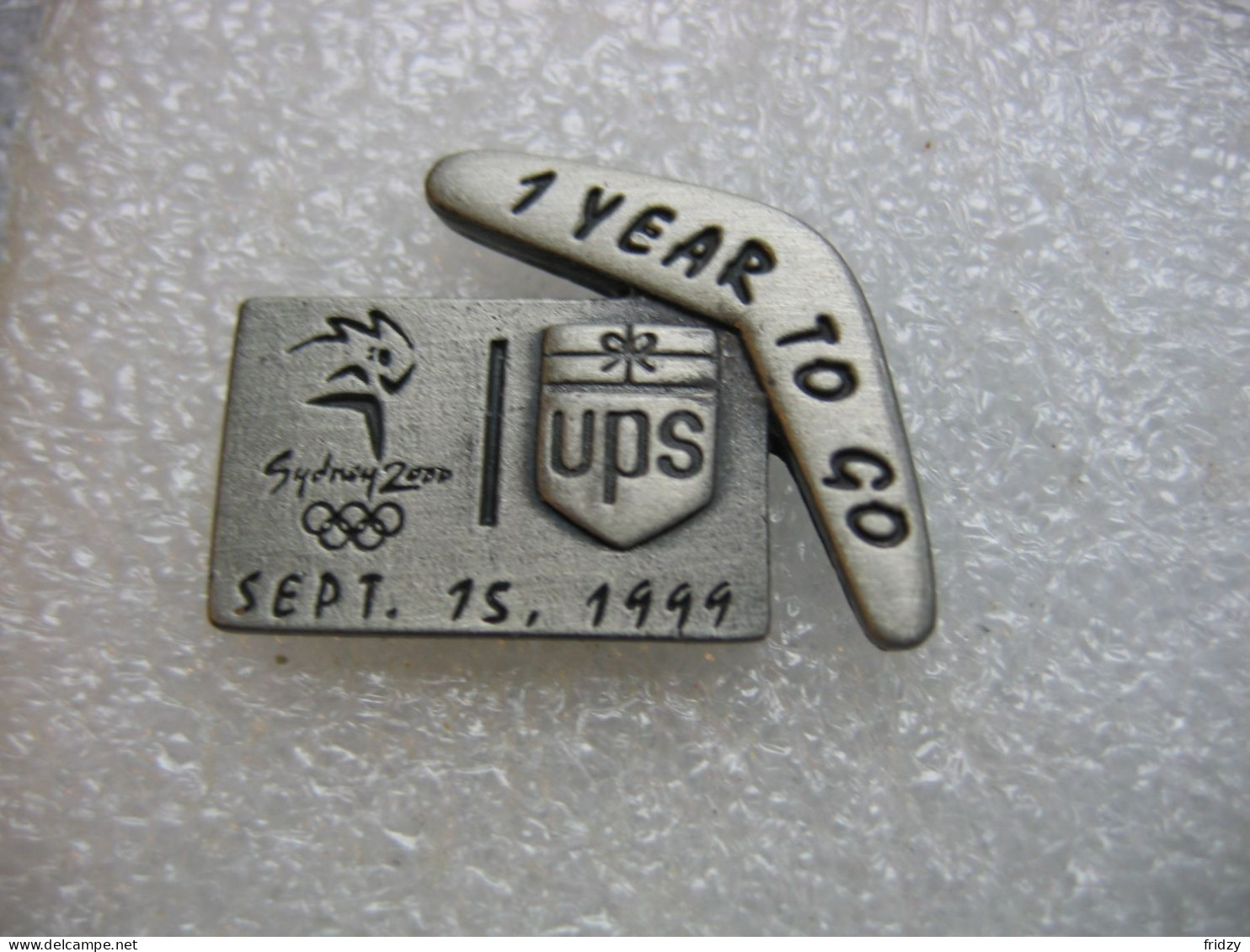 Pin's Des Jeux Olympiques De Sidney En 2000, Sponsorisés Par UPS. 15 Sept 1999, 1 Year To Go - Jeux Olympiques