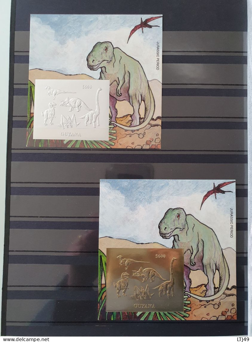 Lot de 3 albums de timbres( +2175 timbres) exceptionnel sur les thème des dinosaures/ Animaux préhistoriques