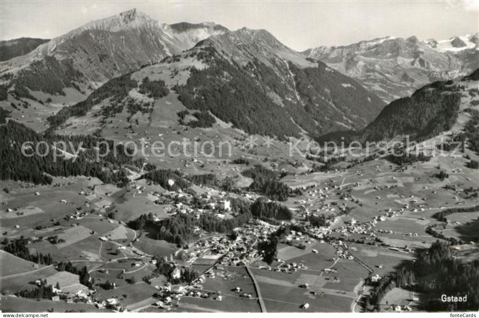 13283799 Gstaad Fliegeraufnahme Gstaad - Andere & Zonder Classificatie