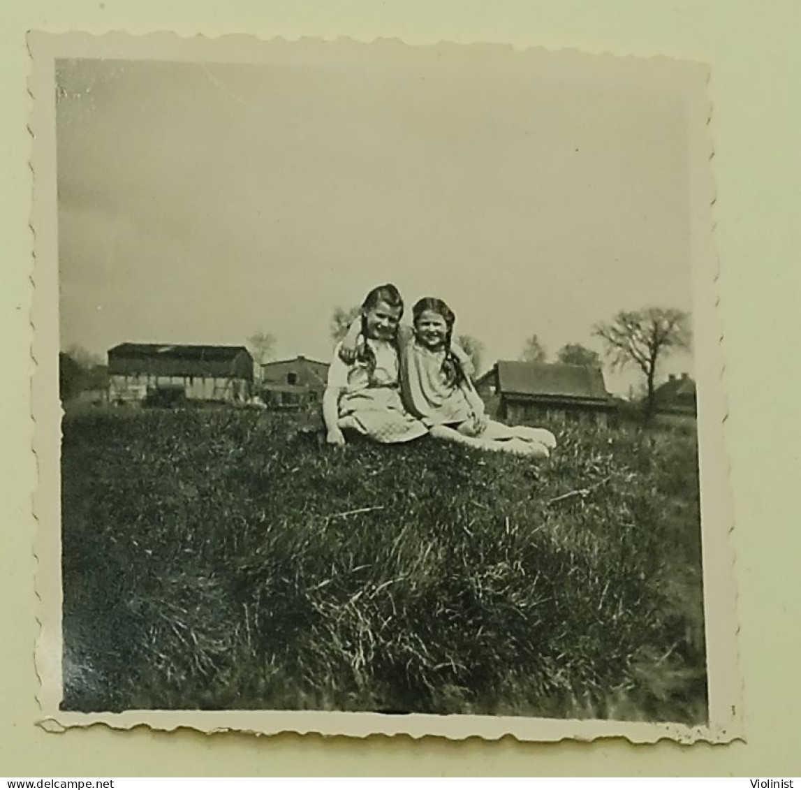 Two Young Girls Are Sitting In Each Other's Arms On The Meadow-photo ...,Torgelow,Germany - Anonymous Persons