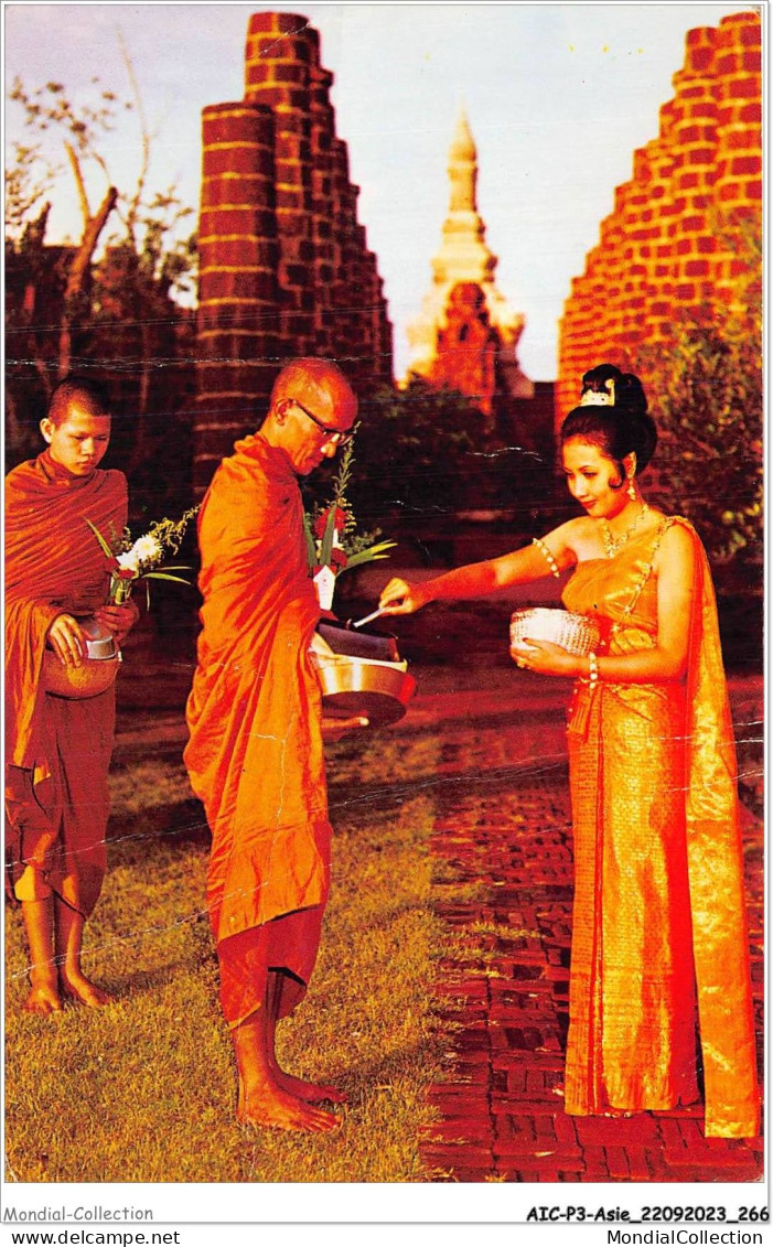 AICP3-ASIE-0386 - A Thai - Young Girl Is Making Merit By Giving Foods To The Thai Priest - Thailand