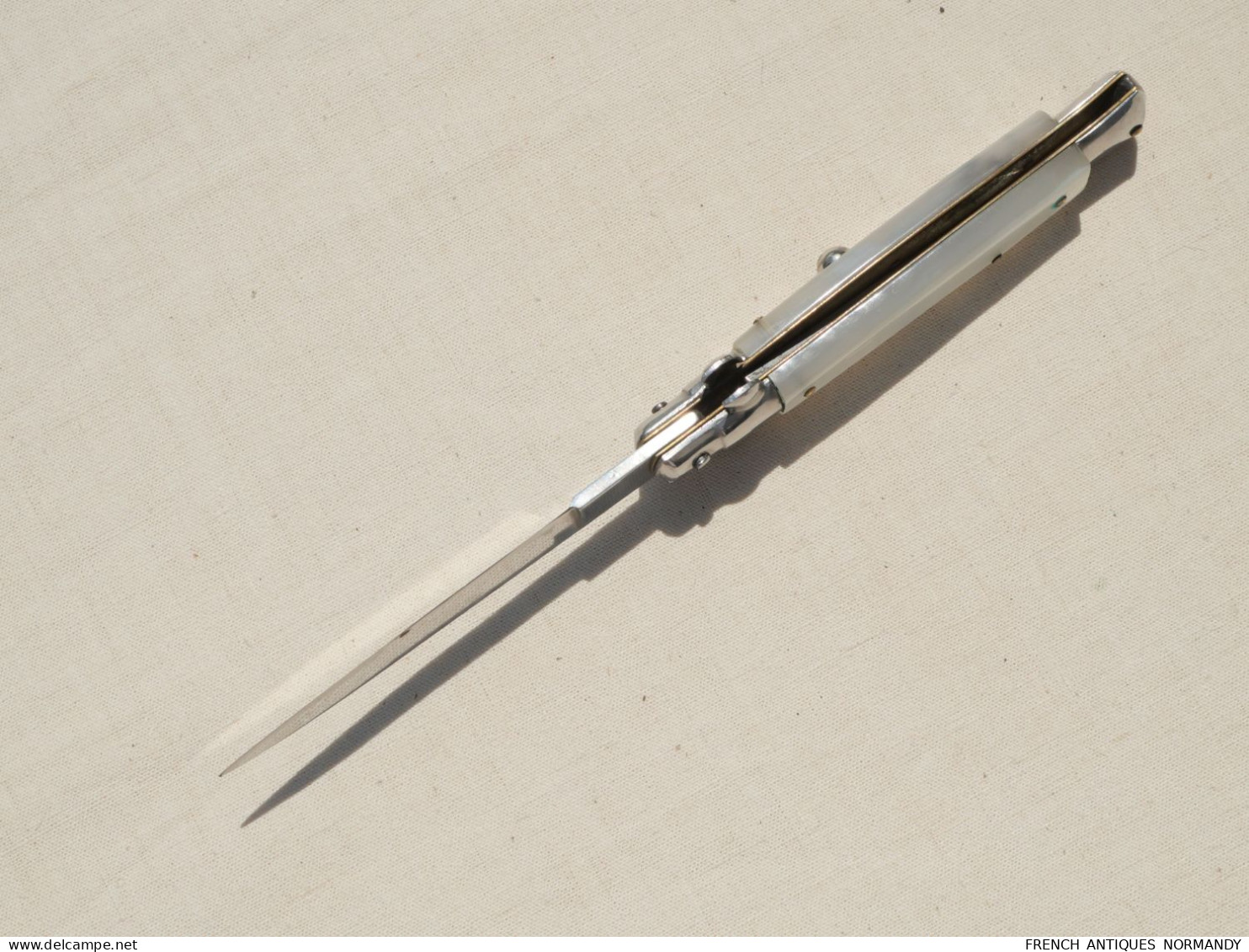 ancien couteau automatique à cran d'arret et sureté marqué ROSTFREI fabrication allemande années 70