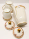 Delcampe - - JOLI SERVICE A CAFE ART DECO PORCELAINE LIMOGES 10 TASSES CAFETIERE SUCRIER  E - Limoges (FRA)