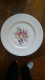 Assiette En Porcelaine.Fleurs Polychromes. - Limoges (FRA)