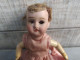 Ancienne Petite Poupée Tête Porcelaine Et Corps Carton Bouilli A Restaurer - Dolls