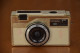 Ancien Appareil Photo FERRANIA 3M Euromatic FC Doré Et Créme - Film Cartouche 126 - Cameras