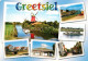 73160199 Greetsiel Windmuehle Schiff Ortsansichten Greetsiel - Krummhoern