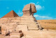 Egypte - Gizeh - Giza - The Sphinx And The Pyramid Of Cheops - Carte Neuve - CPM - Voir Scans Recto-Verso - Gizeh