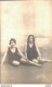 CARTE PHOTO NON IDENTIFIEE REPRESENTANT DEUX FEMMES EN MAILLOT DE BAINS A LA PLAGE - A Identifier