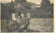 Social History Souvenir Photo Postcard Elegant Coupleon Bench - Photographs