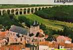 CPSM. LUSIGNAN. VUE AERIENNE. L´EGLISE ET LA VALLEE DE LA VONNE.DATEE 1995 - Lusignan