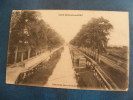 CPA.....ST NICOLAS DU PORT..LE CANAL..PENICHES..ECRITE 1915 - Saint Nicolas De Port