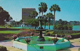 Florida Orlando The Action Center Flowers Trees And Fountain At Lake Eola 1973 - Orlando