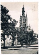 B4948    TIENEN : Kerk Van O.L. Vrouw Ten Poel En Monument Der Gesneuvelden - Tienen