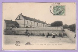 89 - CERISIERS --  La Route De Joigny Et Les Ecoles - Cerisiers