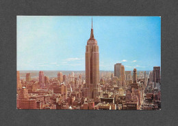 NEW YORK - NEW YORK CITY - UPTOWN SKYLINE SHOWING EMPIRE STATE BUILDING AND R.C.A. BUILDING - BY COLOURPICTURE - Albany